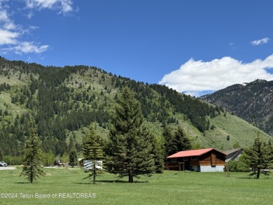 Quaint log cabin living at the base of the Bridger-Teton on Cedar Creek Golf Course in Wyoming - for sale on GolfHomes.com, golf home, golf lot