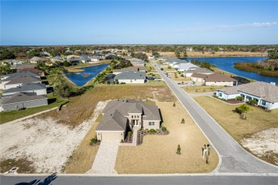 Welcome to the epitome of modern living in the prestigious Glen on Glen Lakes Country Club in Florida - for sale on GolfHomes.com, golf home, golf lot