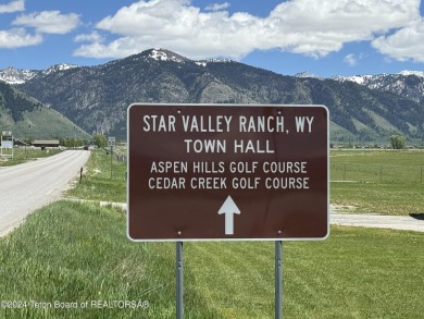 Quaint log cabin living at the base of the Bridger-Teton on Cedar Creek Golf Course in Wyoming - for sale on GolfHomes.com, golf home, golf lot