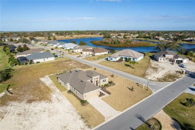 Welcome to the epitome of modern living in the prestigious Glen on Glen Lakes Country Club in Florida - for sale on GolfHomes.com, golf home, golf lot