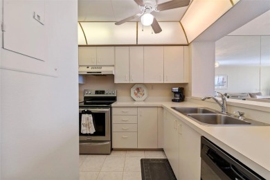 Amazing opportunity to own a top floor condo with breathtaking on Isla Del Sol Yacht and Country Club in Florida - for sale on GolfHomes.com, golf home, golf lot