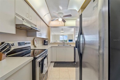 Amazing opportunity to own a top floor condo with breathtaking on Isla Del Sol Yacht and Country Club in Florida - for sale on GolfHomes.com, golf home, golf lot