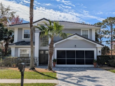 Enjoy this Beautiful two-story pool home, in the private and on The Grand Club - Pine Lakes Course in Florida - for sale on GolfHomes.com, golf home, golf lot