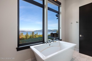 Spectacular custom-built home with beautiful views of Lake Coeur on Gozzer Ranch Golf and Lake Club in Idaho - for sale on GolfHomes.com, golf home, golf lot