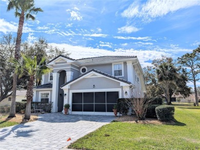 Enjoy this Beautiful two-story pool home, in the private and on The Grand Club - Pine Lakes Course in Florida - for sale on GolfHomes.com, golf home, golf lot