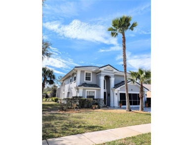 Enjoy this Beautiful two-story pool home, in the private and on The Grand Club - Pine Lakes Course in Florida - for sale on GolfHomes.com, golf home, golf lot