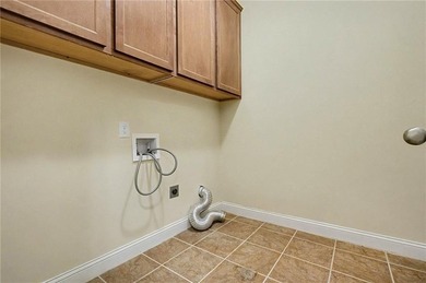 This only 7-year-old home offers exceptional space and on Creekside Golf and Country Club in Georgia - for sale on GolfHomes.com, golf home, golf lot