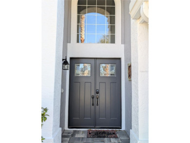 Enjoy this Beautiful two-story pool home, in the private and on The Grand Club - Pine Lakes Course in Florida - for sale on GolfHomes.com, golf home, golf lot