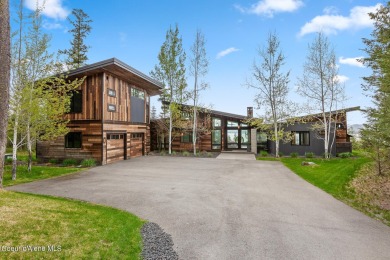 Spectacular custom-built home with beautiful views of Lake Coeur on Gozzer Ranch Golf and Lake Club in Idaho - for sale on GolfHomes.com, golf home, golf lot