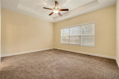 This only 7-year-old home offers exceptional space and on Creekside Golf and Country Club in Georgia - for sale on GolfHomes.com, golf home, golf lot