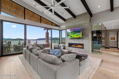 Spectacular custom-built home with beautiful views of Lake Coeur on Gozzer Ranch Golf and Lake Club in Idaho - for sale on GolfHomes.com, golf home, golf lot