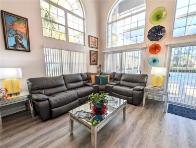 Enjoy this Beautiful two-story pool home, in the private and on The Grand Club - Pine Lakes Course in Florida - for sale on GolfHomes.com, golf home, golf lot