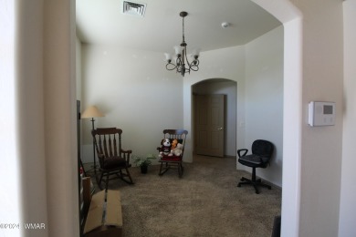 Fairway home has a beautiful split floor plan, large master on Snowflake Municipal Golf Course in Arizona - for sale on GolfHomes.com, golf home, golf lot