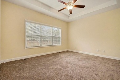 This only 7-year-old home offers exceptional space and on Creekside Golf and Country Club in Georgia - for sale on GolfHomes.com, golf home, golf lot