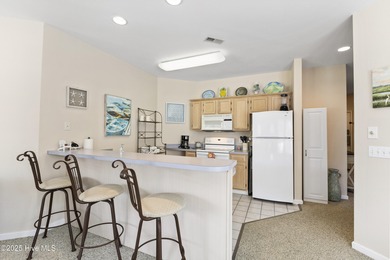 An inviting, fully furnished, 2 bedroom 2 bathroom condo is now on Sea Trail Golf Resort in North Carolina - for sale on GolfHomes.com, golf home, golf lot