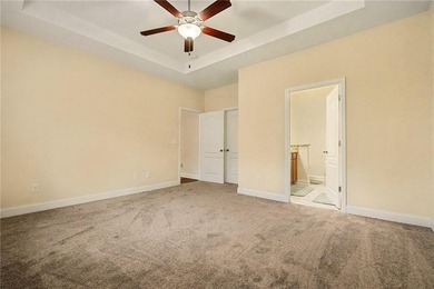 Located in the heart of the Creekside Golf & Country Club on Creekside Golf and Country Club in Georgia - for sale on GolfHomes.com, golf home, golf lot