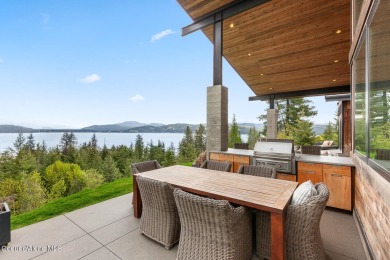 Spectacular custom-built home with beautiful views of Lake Coeur on Gozzer Ranch Golf and Lake Club in Idaho - for sale on GolfHomes.com, golf home, golf lot