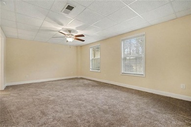 Located in the heart of the Creekside Golf & Country Club on Creekside Golf and Country Club in Georgia - for sale on GolfHomes.com, golf home, golf lot