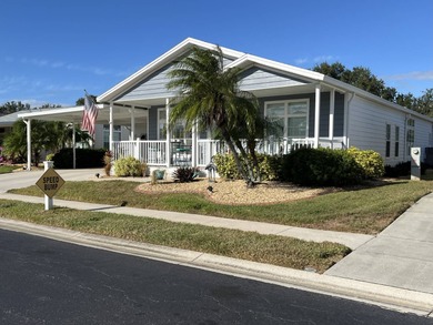 Enjoy resort-style living in this beautifully maintained on The Riverside Golf Club in Florida - for sale on GolfHomes.com, golf home, golf lot