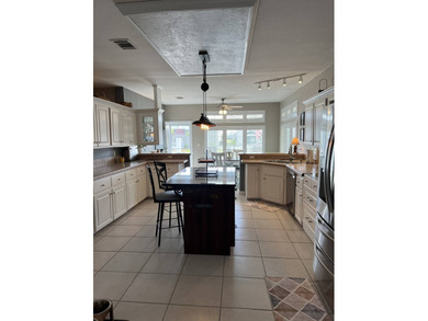 Enjoy resort-style living in this beautifully maintained on The Riverside Golf Club in Florida - for sale on GolfHomes.com, golf home, golf lot