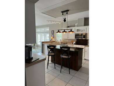 Enjoy resort-style living in this beautifully maintained on The Riverside Golf Club in Florida - for sale on GolfHomes.com, golf home, golf lot