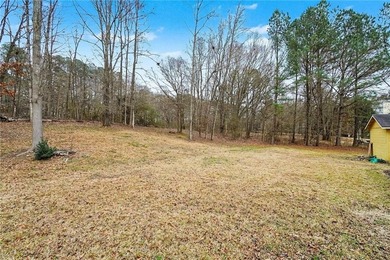 Located in the heart of the Creekside Golf & Country Club on Creekside Golf and Country Club in Georgia - for sale on GolfHomes.com, golf home, golf lot