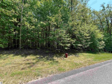 Beautiful spacious lot, on Forest Highlands, nestled in the on Cedar River Golf Course in Michigan - for sale on GolfHomes.com, golf home, golf lot