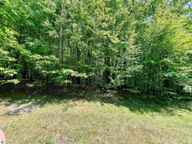 Beautiful spacious lot, on Forest Highlands, nestled in the on Cedar River Golf Course in Michigan - for sale on GolfHomes.com, golf home, golf lot