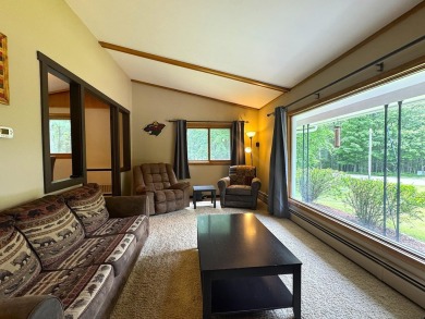 Located in the BRINKLAND neighborhood, this 3BD/2.5BA ranch home on Minocqua Country Club in Wisconsin - for sale on GolfHomes.com, golf home, golf lot