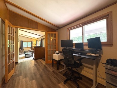 Located in the BRINKLAND neighborhood, this 3BD/2.5BA ranch home on Minocqua Country Club in Wisconsin - for sale on GolfHomes.com, golf home, golf lot