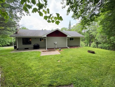 Located in the BRINKLAND neighborhood, this 3BD/2.5BA ranch home on Minocqua Country Club in Wisconsin - for sale on GolfHomes.com, golf home, golf lot