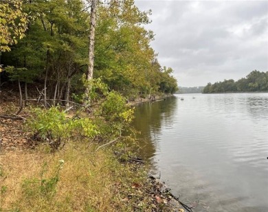 Build your dream home or invest in this gorgeous lakefront lot on Holiday Island Executive Golf Course in Arkansas - for sale on GolfHomes.com, golf home, golf lot