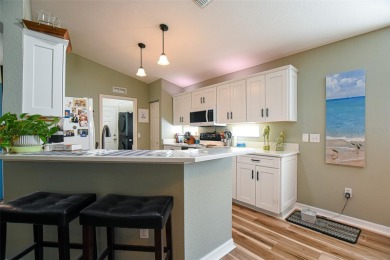 This beautifully updated 2-bedroom, 2-bath villa with a 2-car on Stonecrest Golf and Club Club in Florida - for sale on GolfHomes.com, golf home, golf lot
