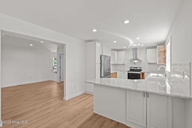 Welcome to this beautifully renovated 3-bedroom, 2-bath home in on Seven Lakes Country Club in North Carolina - for sale on GolfHomes.com, golf home, golf lot