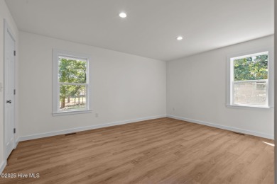 Welcome to this beautifully renovated 3-bedroom, 2-bath home in on Seven Lakes Country Club in North Carolina - for sale on GolfHomes.com, golf home, golf lot