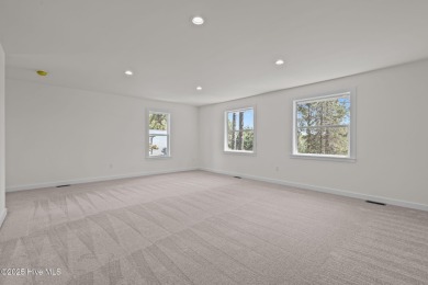 Welcome to this beautifully renovated 3-bedroom, 2-bath home in on Seven Lakes Country Club in North Carolina - for sale on GolfHomes.com, golf home, golf lot
