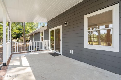 Welcome to this beautifully renovated 3-bedroom, 2-bath home in on Seven Lakes Country Club in North Carolina - for sale on GolfHomes.com, golf home, golf lot