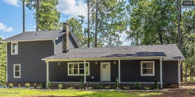 Welcome to this beautifully renovated 3-bedroom, 2-bath home in on Seven Lakes Country Club in North Carolina - for sale on GolfHomes.com, golf home, golf lot
