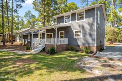 Welcome to this beautifully renovated 3-bedroom, 2-bath home in on Seven Lakes Country Club in North Carolina - for sale on GolfHomes.com, golf home, golf lot