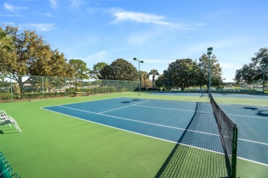 This beautifully updated 2-bedroom, 2-bath villa with a 2-car on Stonecrest Golf and Club Club in Florida - for sale on GolfHomes.com, golf home, golf lot
