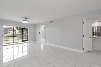 NEW! NEW! NEW! RELAXING WIDE WATER VIEWS! TOTALLY UPDATED LIKE on Hollybrook Golf and Tennis Club  in Florida - for sale on GolfHomes.com, golf home, golf lot
