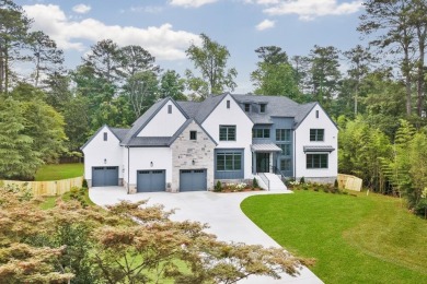 This exceptional new custom construction all brick home with 6 on Indian Hills Country Club in Georgia - for sale on GolfHomes.com, golf home, golf lot