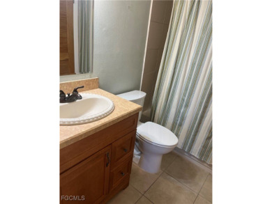 This one bedroom one bathroom has updated kitchen cabinets with on Seven Lakes Golf and Tennis Community in Florida - for sale on GolfHomes.com, golf home, golf lot