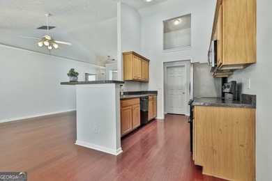 Welcome to this adorable and inviting 3-bedroom, 2-bath on Summergrove Golf Club in Georgia - for sale on GolfHomes.com, golf home, golf lot