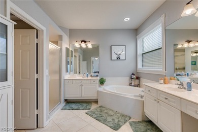 Beautifully updated single-family home located in the gated on Gateway Golf and Country Club in Florida - for sale on GolfHomes.com, golf home, golf lot