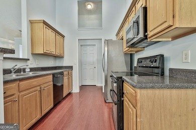 Welcome to this adorable and inviting 3-bedroom, 2-bath on Summergrove Golf Club in Georgia - for sale on GolfHomes.com, golf home, golf lot