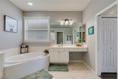 Beautifully updated single-family home located in the gated on Gateway Golf and Country Club in Florida - for sale on GolfHomes.com, golf home, golf lot