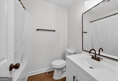 This 3-bedroom, 2-bath home has been completely updated from top on Golf Club of Macon in Georgia - for sale on GolfHomes.com, golf home, golf lot