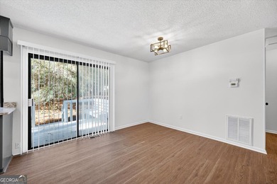 This 3-bedroom, 2-bath home has been completely updated from top on Golf Club of Macon in Georgia - for sale on GolfHomes.com, golf home, golf lot