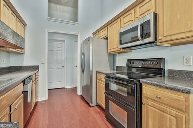 Welcome to this adorable and inviting 3-bedroom, 2-bath on Summergrove Golf Club in Georgia - for sale on GolfHomes.com, golf home, golf lot